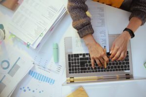 hands on a computer keyboard